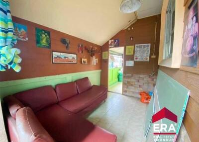 Cozy living room with red sectional sofa