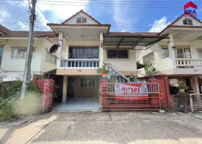 Two-story townhouse with gated front patio