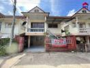 Two-story townhouse with gated front patio