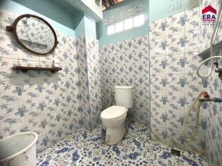 Bathroom with floral tile design