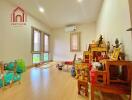 Bright living room with wooden flooring and traditional decorations