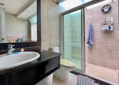 Modern bathroom with shower area and sink