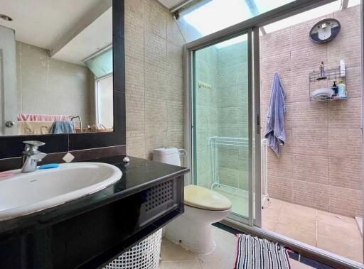 Modern bathroom with shower area and sink