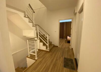 Spacious hallway with stairs