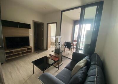 Modern living room with a view of the balcony