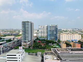 View of residential and commercial buildings from an elevated point