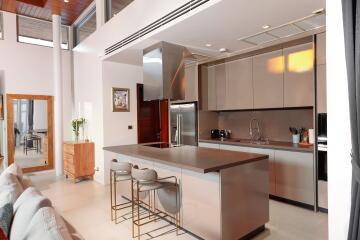 Modern kitchen with island and bar stools