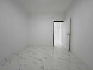 Minimalistic empty room with marble floor