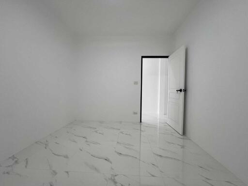 Minimalistic empty room with marble floor