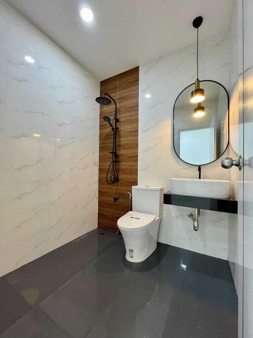 Modern bathroom with shower and toilet