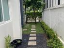 Outdoor garden area with a walkway and plants