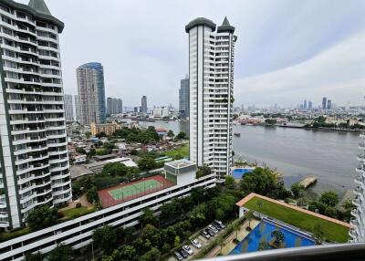 City skyline with river view from a high-rise balcony