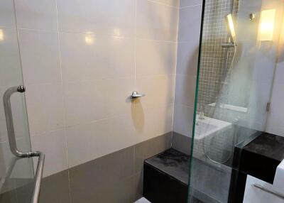 Modern bathroom with glass shower enclosure