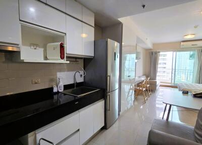 Modern kitchen and dining area with large windows