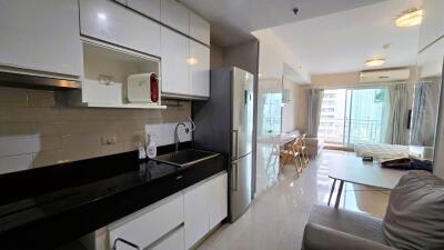 Modern kitchen and dining area with large windows