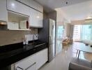 Modern kitchen and dining area with large windows