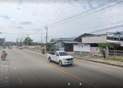 Street view with buildings and vehicles