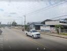 Street view with buildings and vehicles