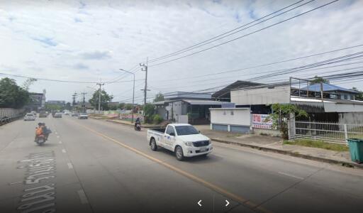 Street view with buildings and vehicles