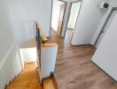 Hallway and staircase view of a modern interior space