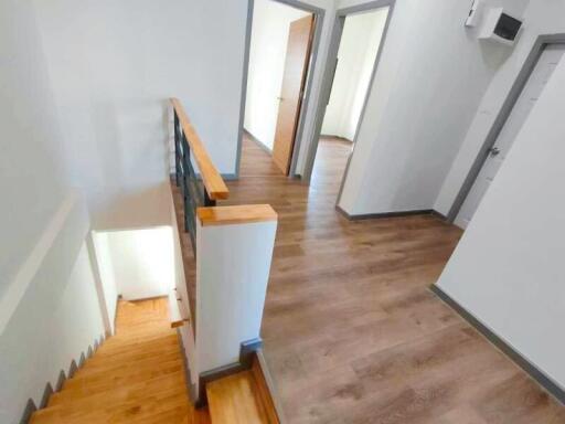 Hallway and staircase view of a modern interior space