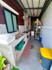 Outdoor kitchen with storage space