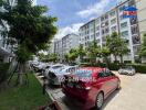 Apartment building exterior with parking area