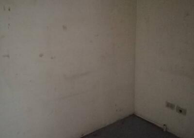 Empty room with bare walls