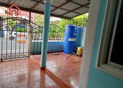 Covered outdoor area with tiled floor