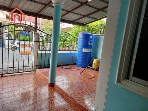 Covered outdoor area with tiled floor