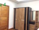 Bedroom with wooden wardrobe and door