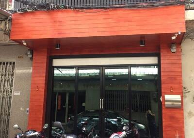 Exterior view of a building with parked motorcycles