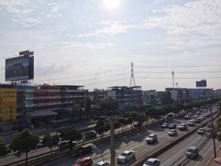 Street view with buildings and vehicles