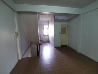 Empty interior hallway with staircase