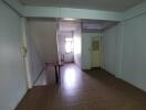 Empty interior hallway with staircase