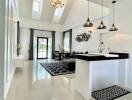 Modern living area with high ceiling and kitchen island