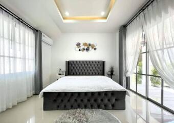 Modern well-lit bedroom