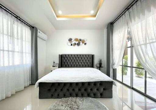 Modern well-lit bedroom