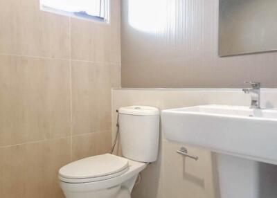 Modern bathroom with sink and toilet