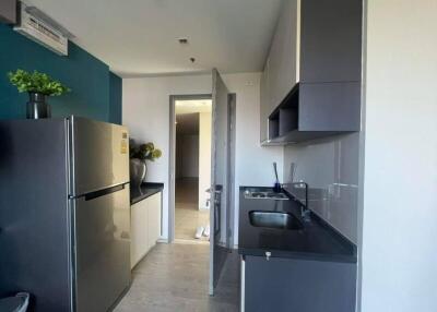 Modern kitchen with refrigerator and sink