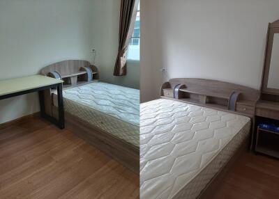 Bedroom with wooden furniture, desk, and bed