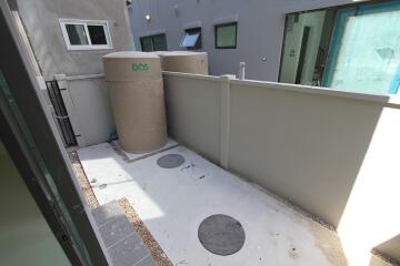 small outdoor section with water tanks