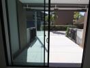 View of the patio from inside through sliding glass doors