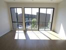 Spacious living room with large windows