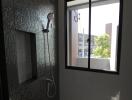 Bathroom with textured wall tiles and window