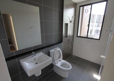 Modern bathroom with large window