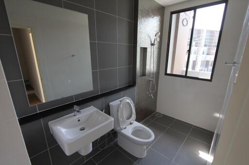 Modern bathroom with large window