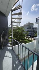 Modern balcony with spiral staircase