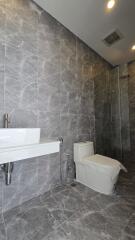 Modern bathroom with marble tiles