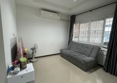 Modern living room with air conditioning and large window